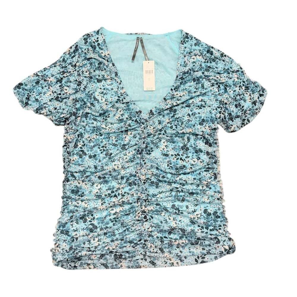 By Anthropologie
